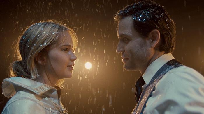 Jennifer Lawrence and Edgar Ramirez in the rain