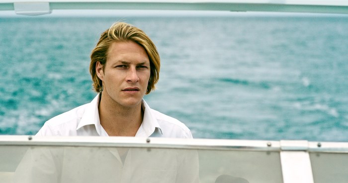Luke Bracey on a boat