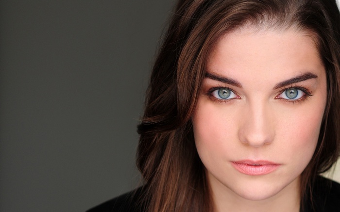 Woman with blue eyes and brown hair