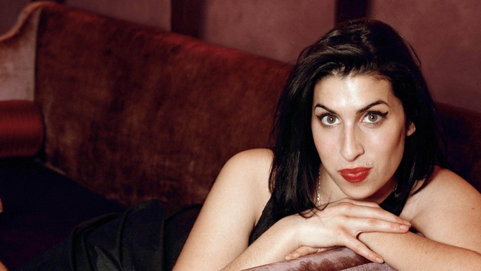 Amy Winehouse on a couch