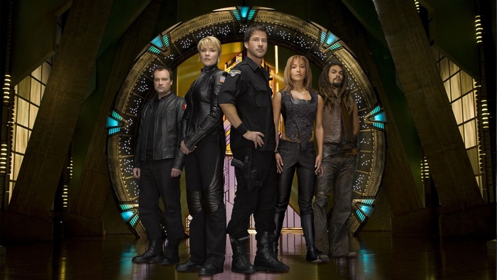Stargate Atlantis cast in front of the Stargate