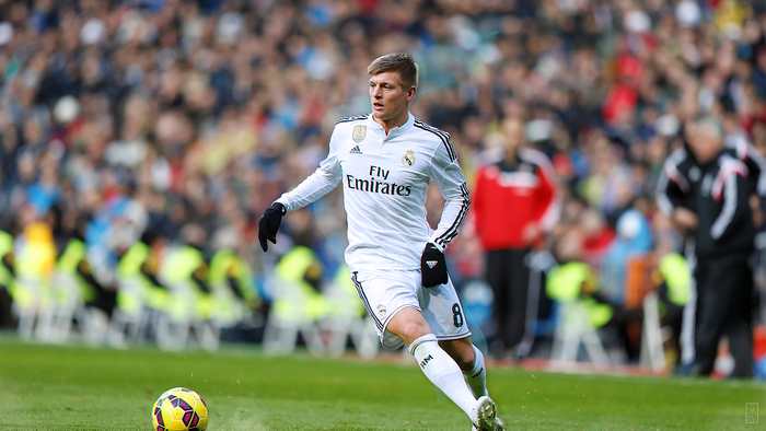 Toni Kroos playing soccer