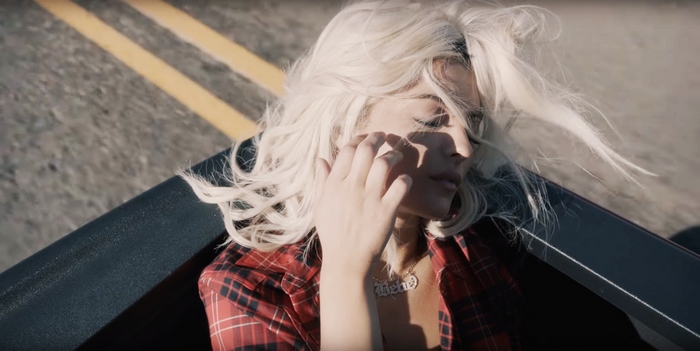 Bebe Rexha in a car