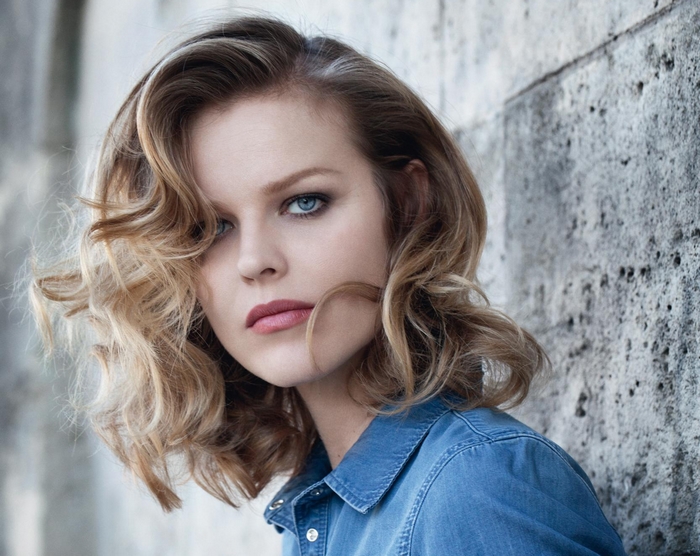 Eva Herzigová in a blue denim shirt