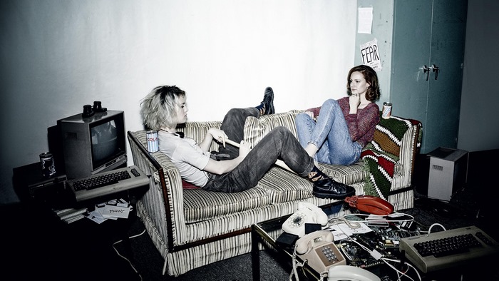 Mackenzie Davis and another person in a room