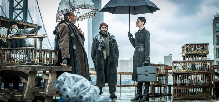 Laurence Fishburne and two others with pigeons