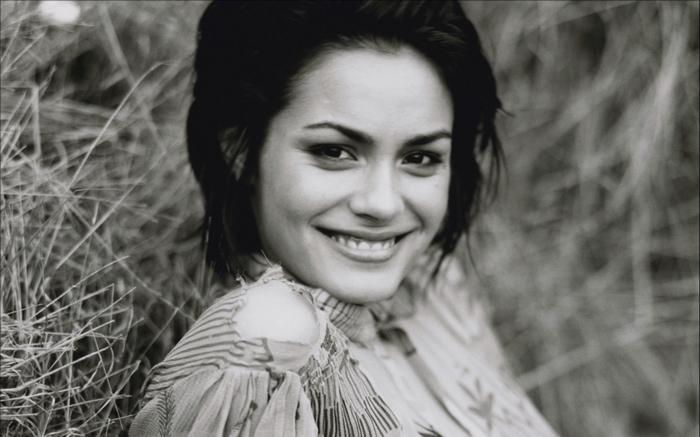 Shannyn Sossamon in tall grass