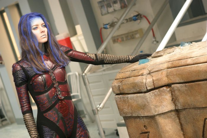 Amy Acker as a blue-skinned alien in a sci-fi costume