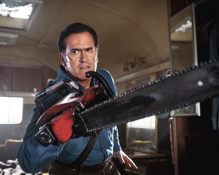 Bruce Campbell with chainsaw