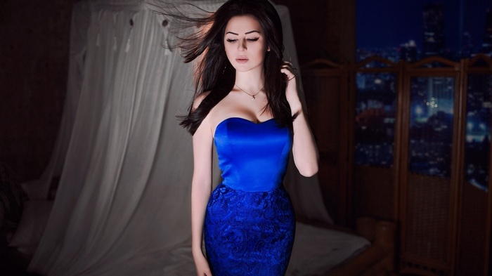 Woman in a blue strapless dress