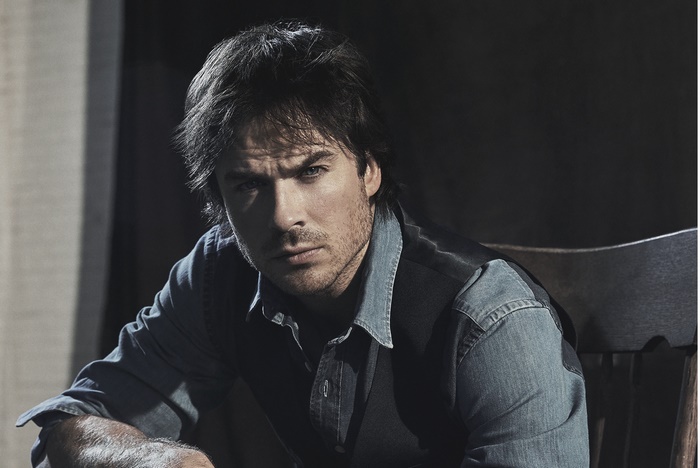 Ian Somerhalder sitting in a chair