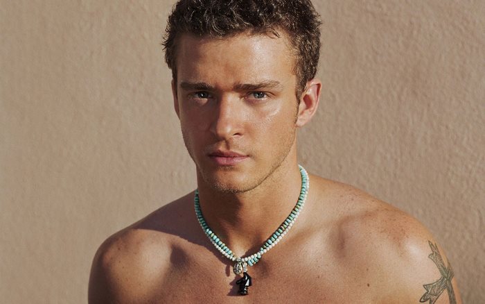 Justin Timberlake wearing a beaded necklace