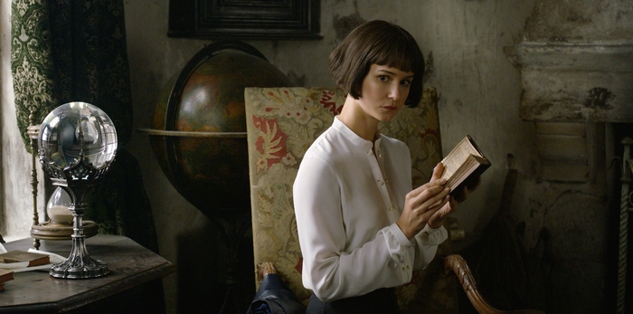 Katherine Waterston reading a book