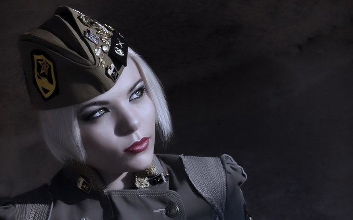 Woman in military uniform with medals