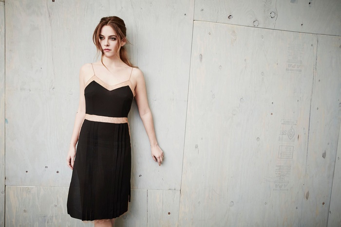 Riley Keough in black dress