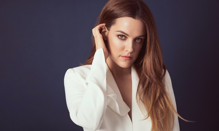 Riley Keough in a white blazer