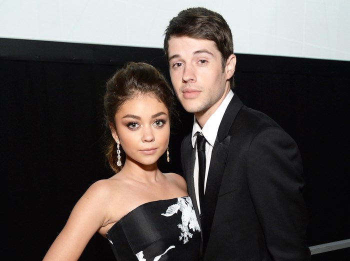Sarah Hyland and a man in suits
