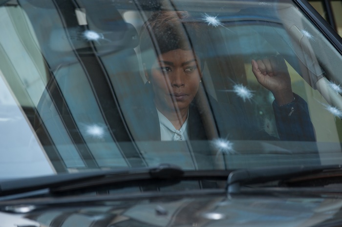 Angela Bassett in a car
