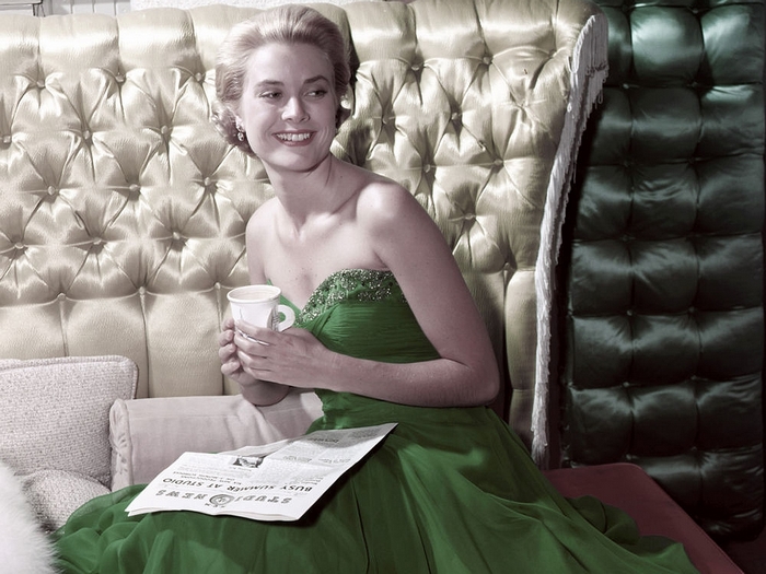 Grace Kelly holding a cup