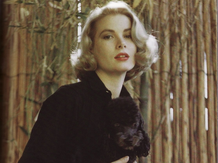 Grace Kelly with a poodle