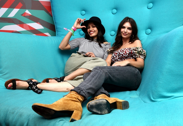 Freida Pinto and Emily Ratajkowski on a couch