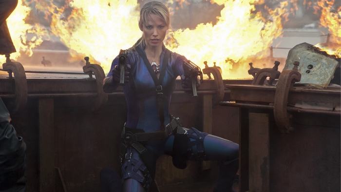 Jill Valentine from Resident Evil with guns and explosion