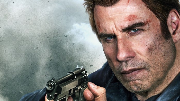 John Travolta holding a gun