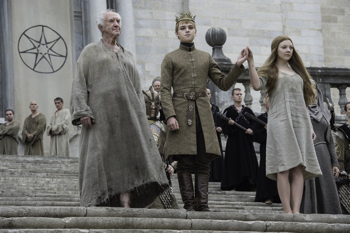 Jonathan Pryce and children on steps