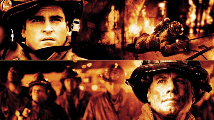 John Travolta and Joaquin Phoenix in Ladder 49