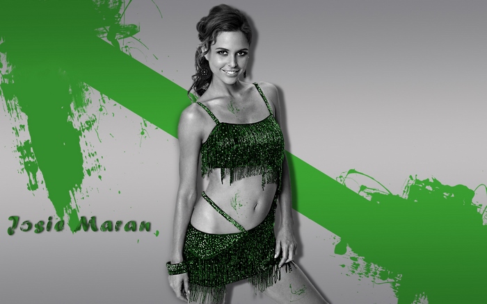 Josie Maran in a green costume