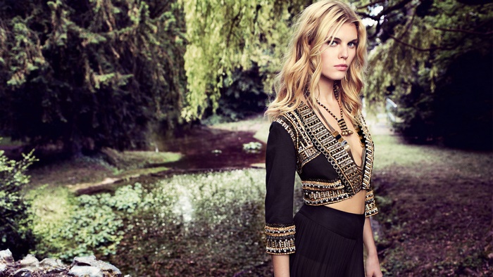 Maryna Linchuk in a forest setting