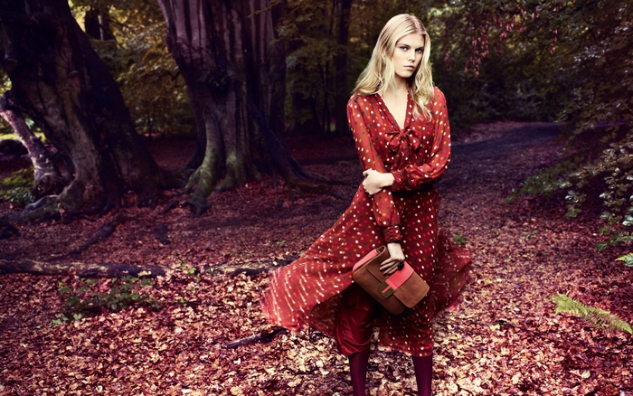 Maryna Linchuk in a red polka dot dress