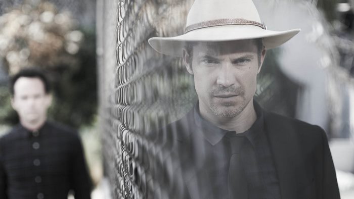 Timothy Olyphant wearing a hat