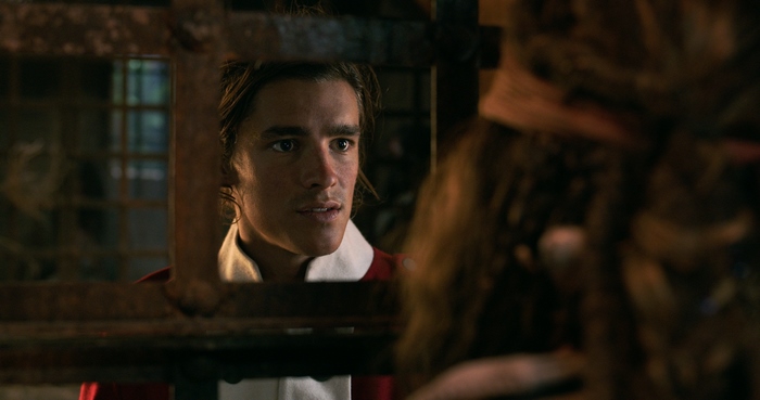 Brenton Thwaites in a red and white outfit