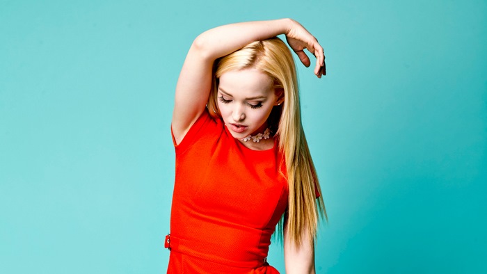 Dove Cameron in a red dress