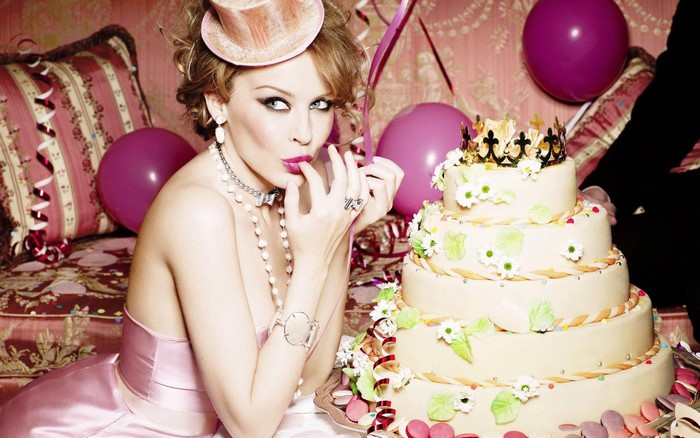 Kylie Minogue with a birthday cake