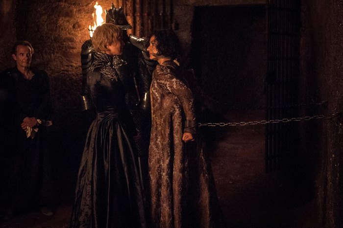 Indira Varma in a dark dungeon