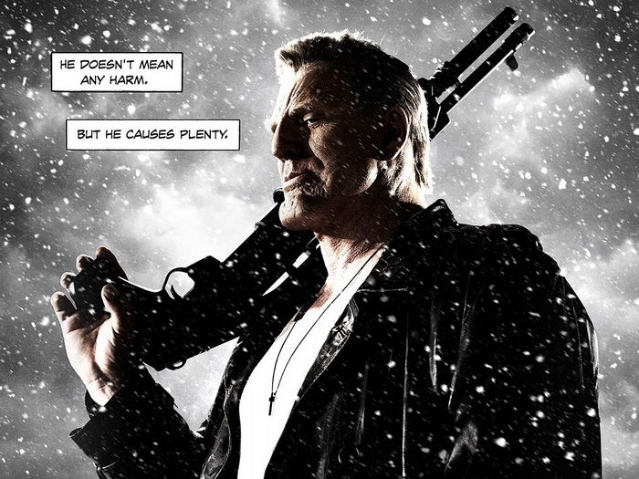 Marv from Sin City holding a rifle
