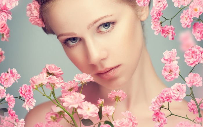 Woman with pink roses