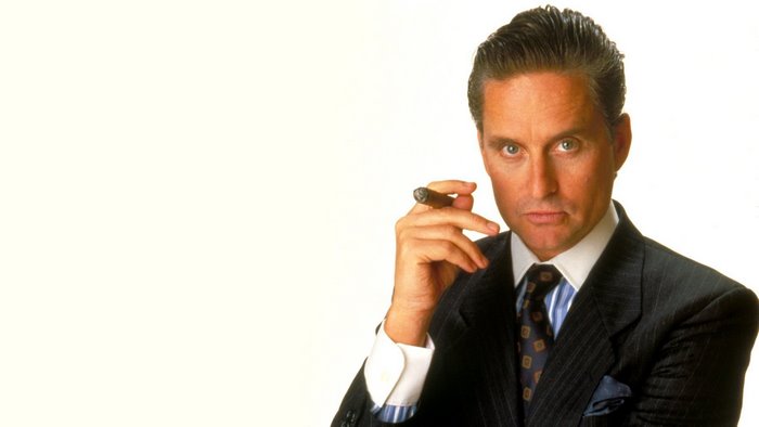 Michael Douglas holding a cigar