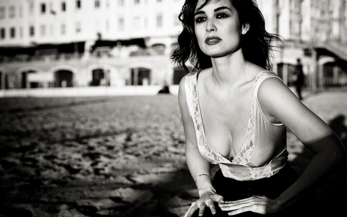 Bérénice Marlohe on a beach