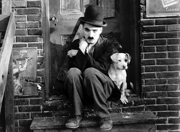 Charlie Chaplin with a dog