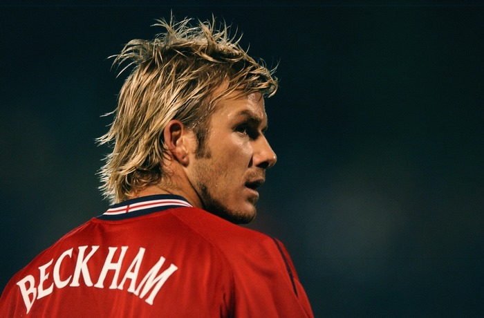 David Beckham in red jersey