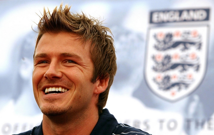 David Beckham with England logo