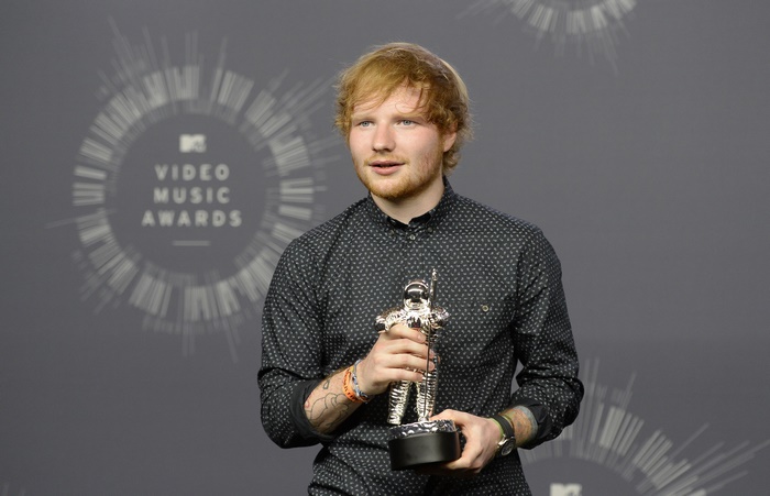 Ed Sheeran holding MTV Video Music Award