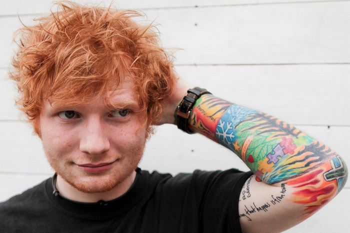 Ed Sheeran with colorful arm tattoos