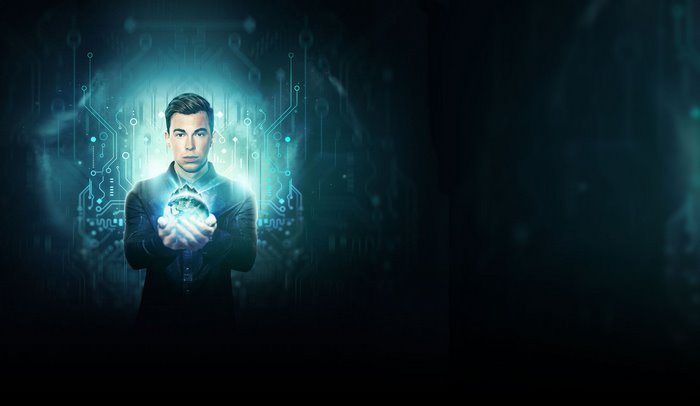 Hardwell holding a glowing globe with digital background