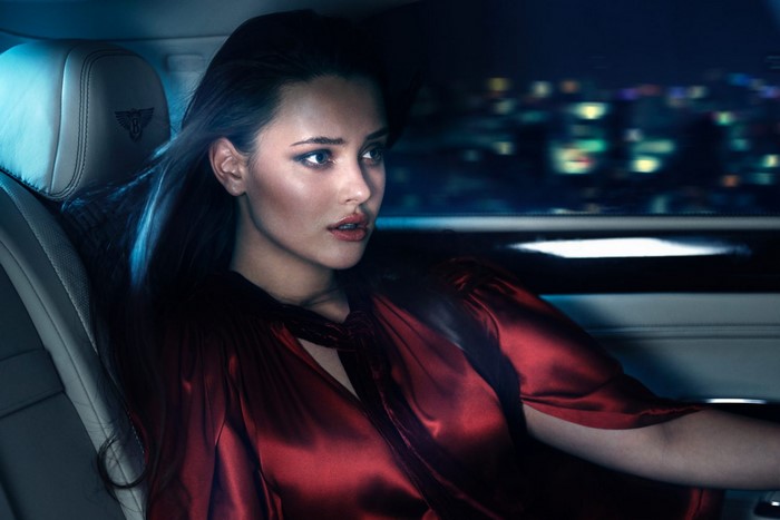 Katherine Langford in a car at night