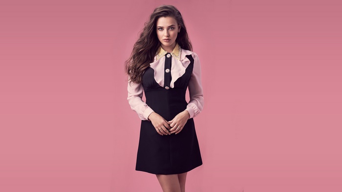 Katherine Langford in a black and pink dress