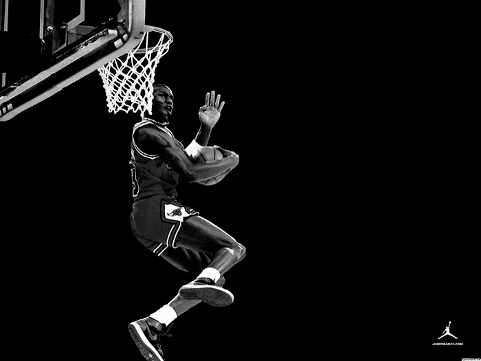 Michael Jordan dunking a basketball